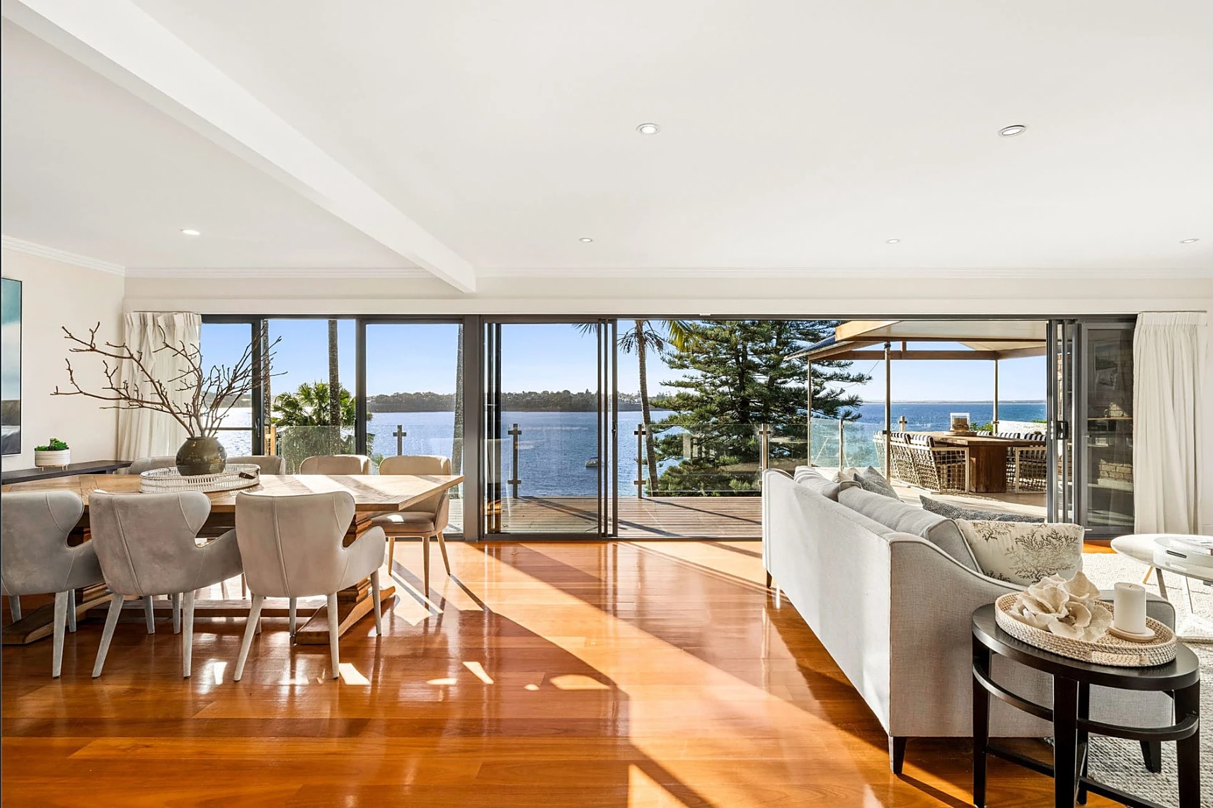 Living and dining opening to the water