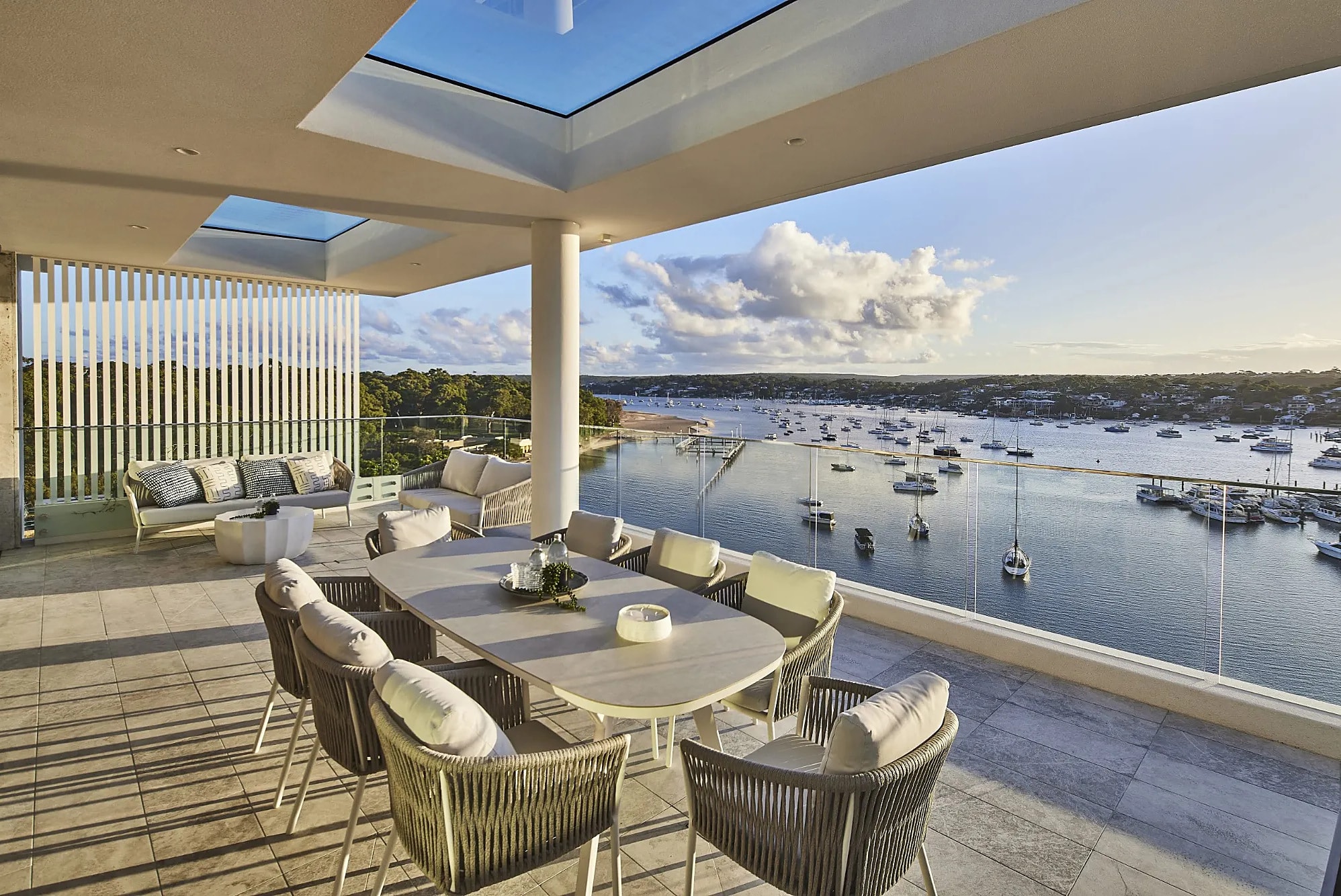 Covered terrace over a bay full of moored boats