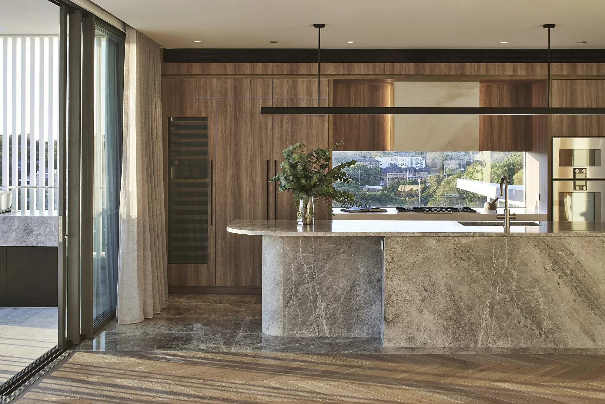 Kitchen island in grey marble