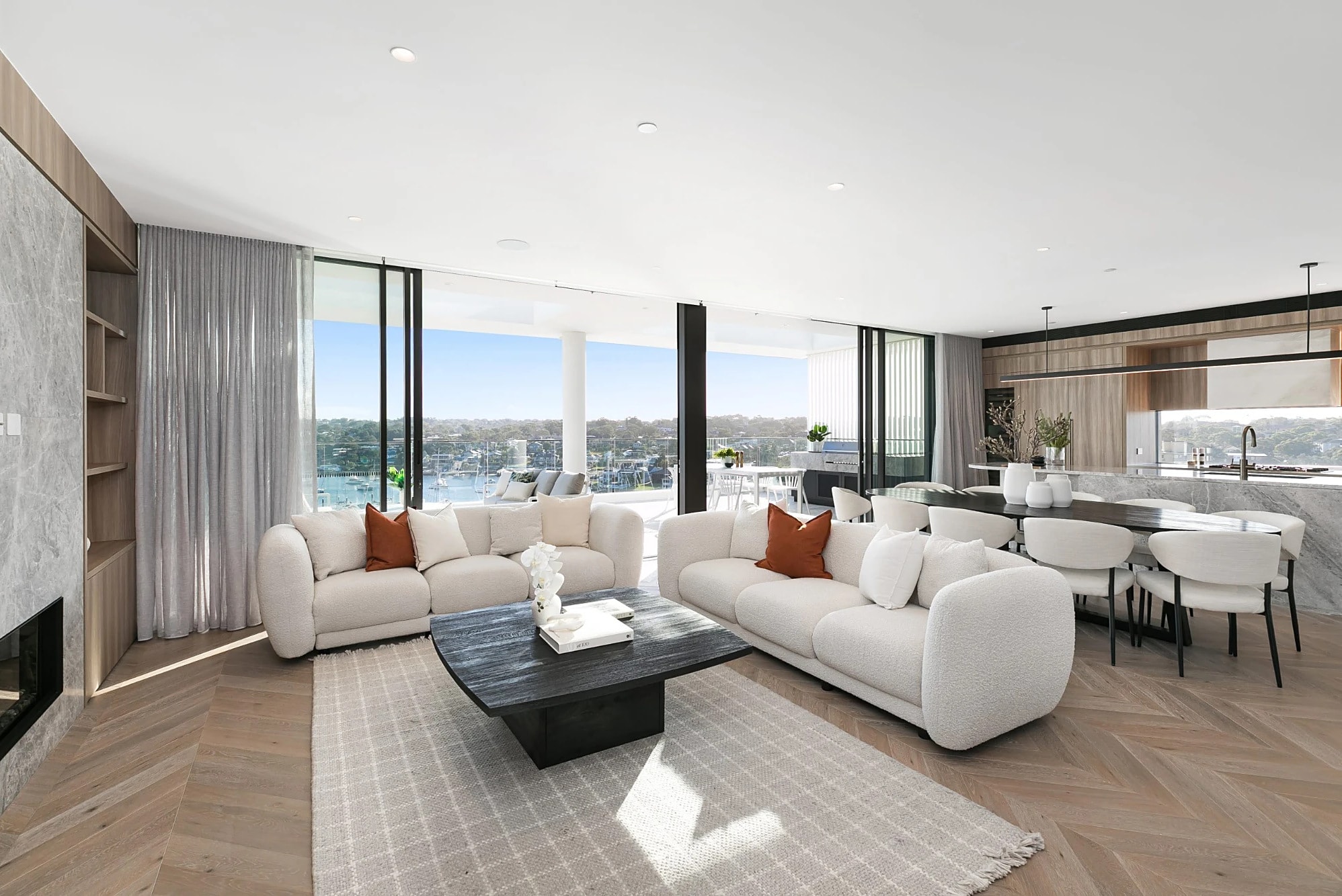 Open living and dining with harbour views