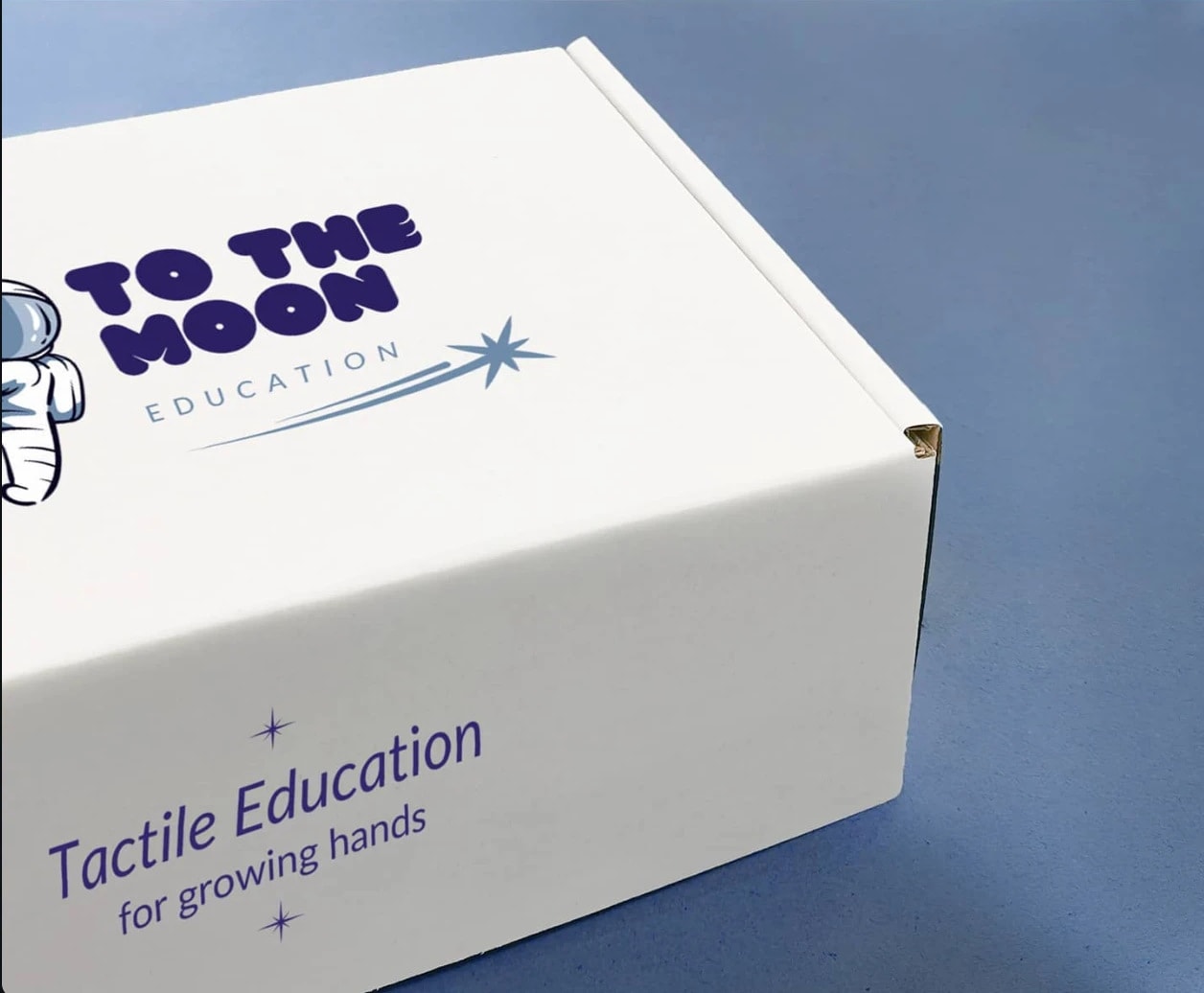 A white printed mailer box for an education brand