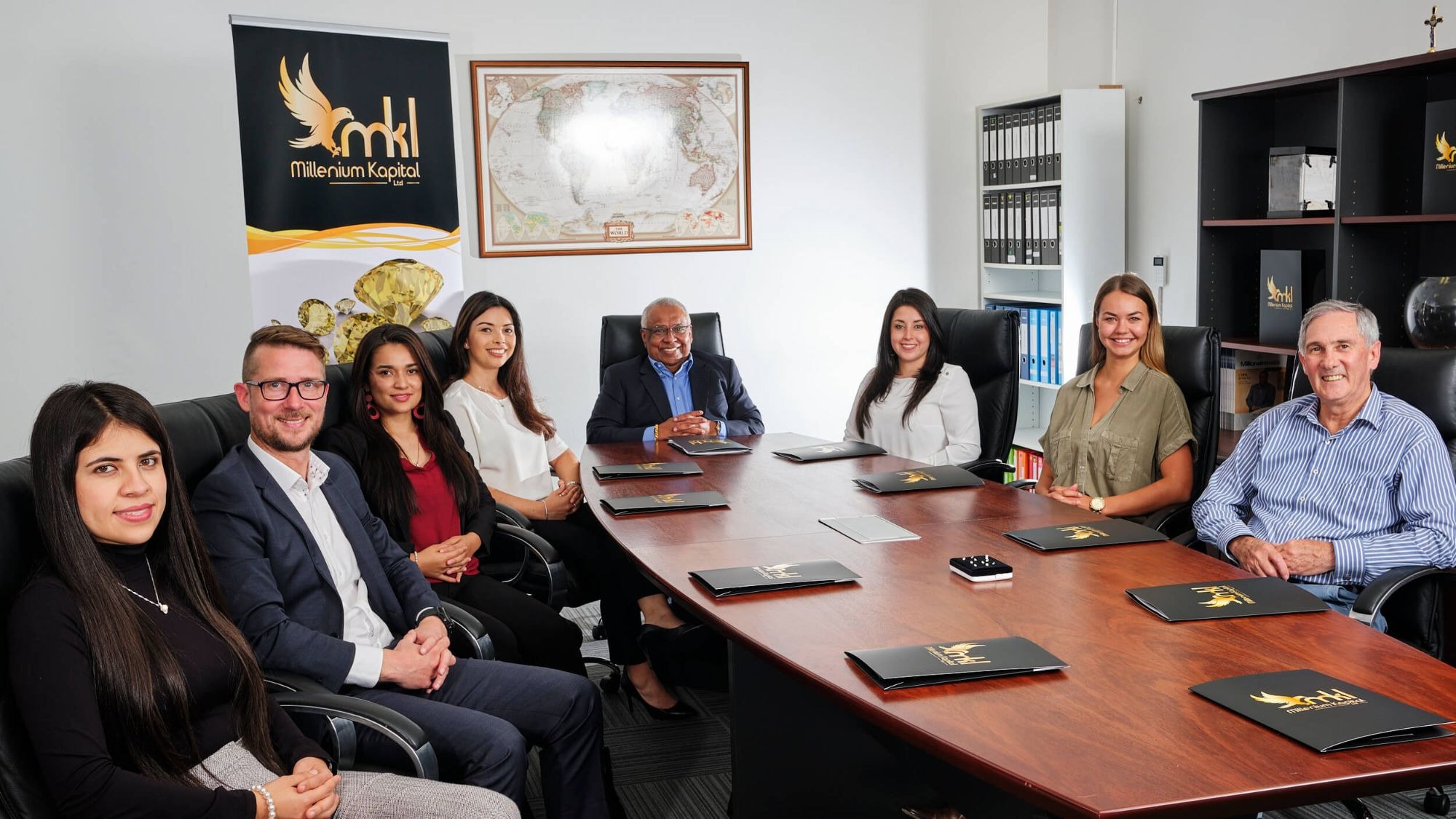 A team seated around a boardroom table
