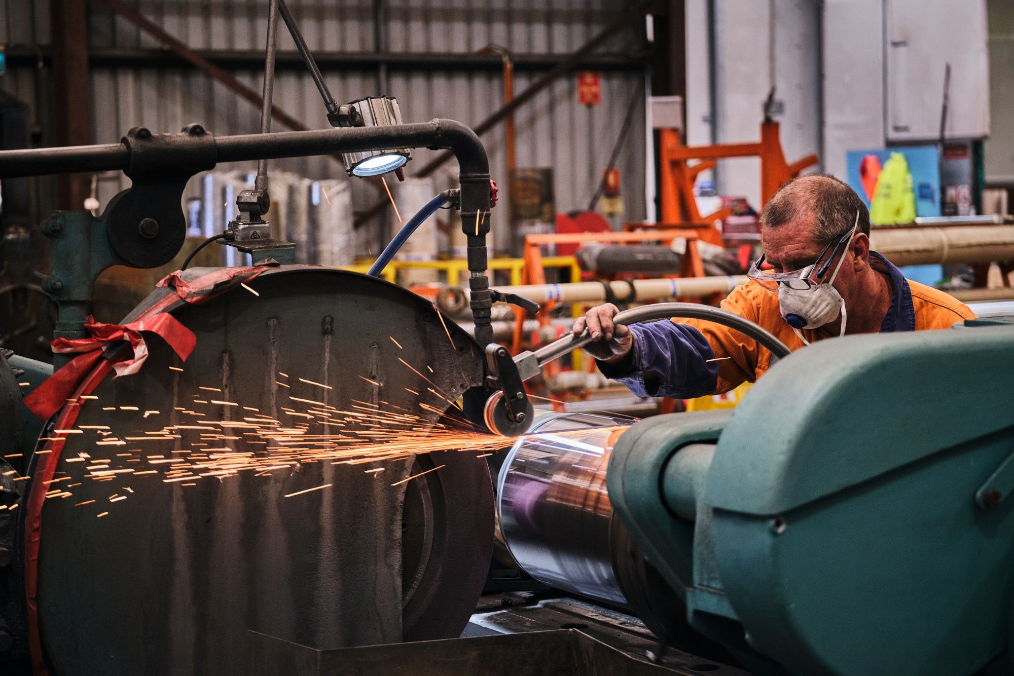 Sparks from a grinder in an engineering workshop