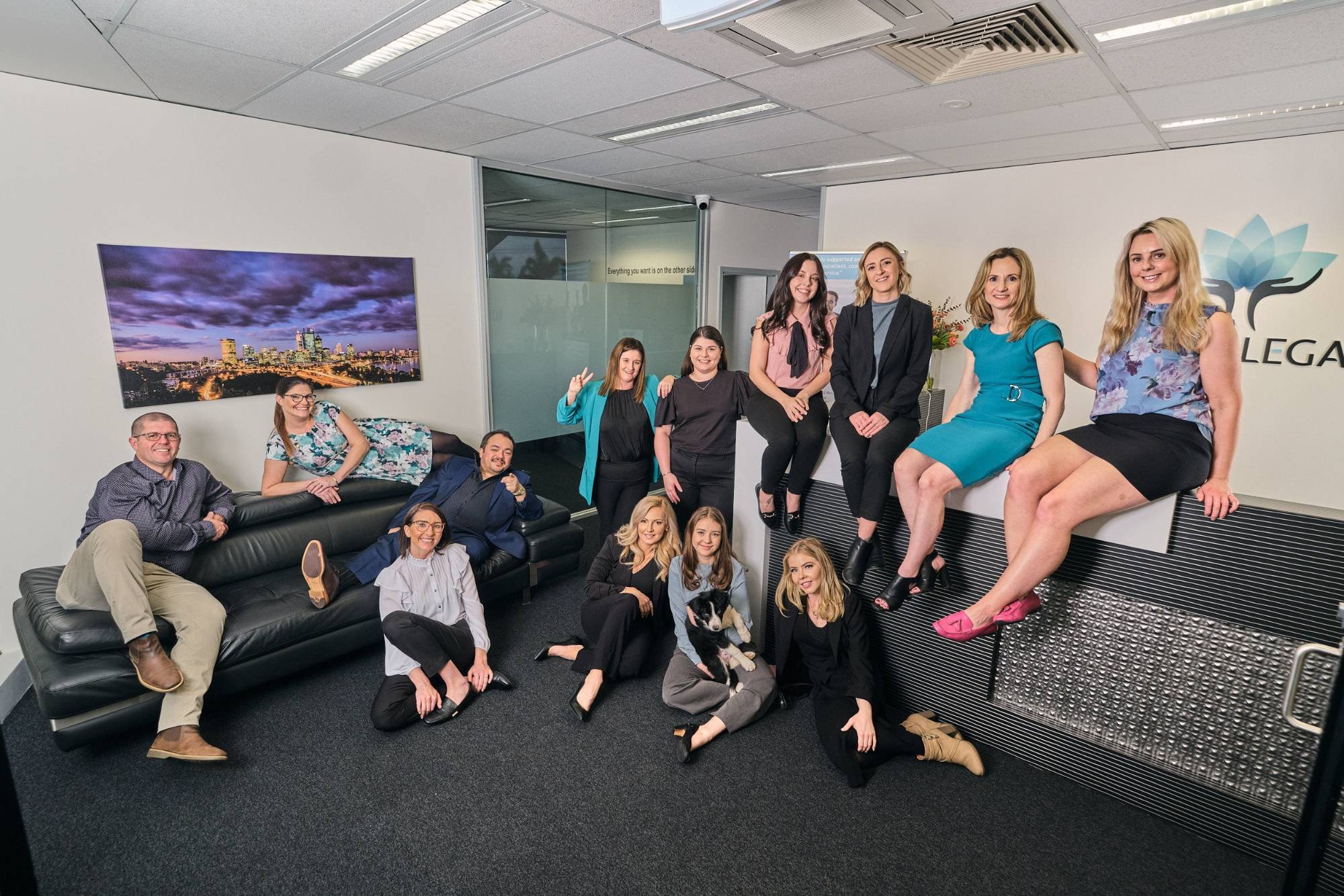 A relaxed team portrait in an office reception